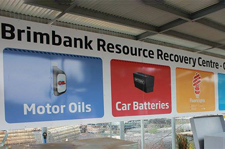 Resource Recovery Centre signage indicating motor oil, car batteries, fluro lights